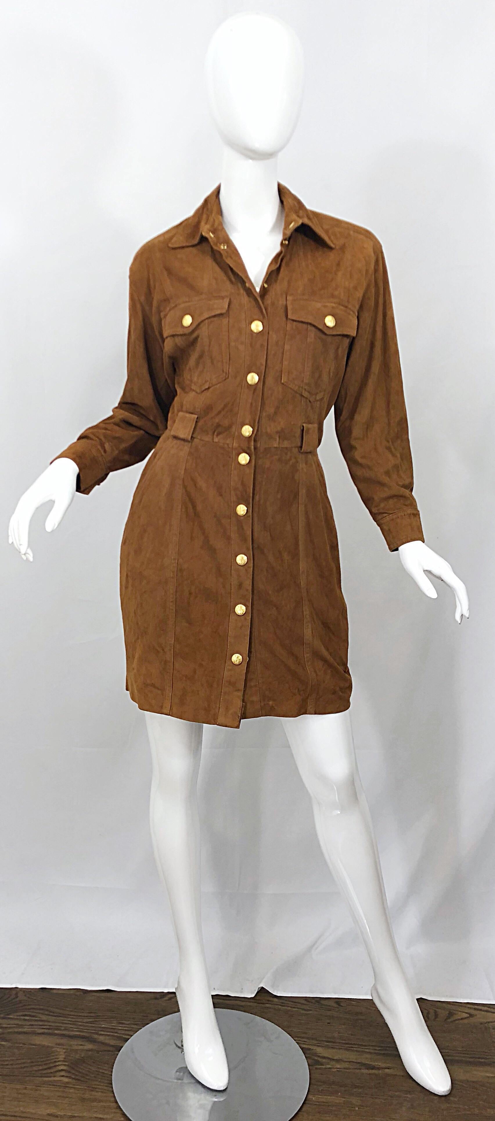 Classic vintage 90s ESCADA by MARGARETHA LEY saddle brown color suede leather jacket dress! The perfect color that matches everything. Super soft luxurious suede is fully lined. Gold logo embossed snap buttons up the front, at each breast pocket,