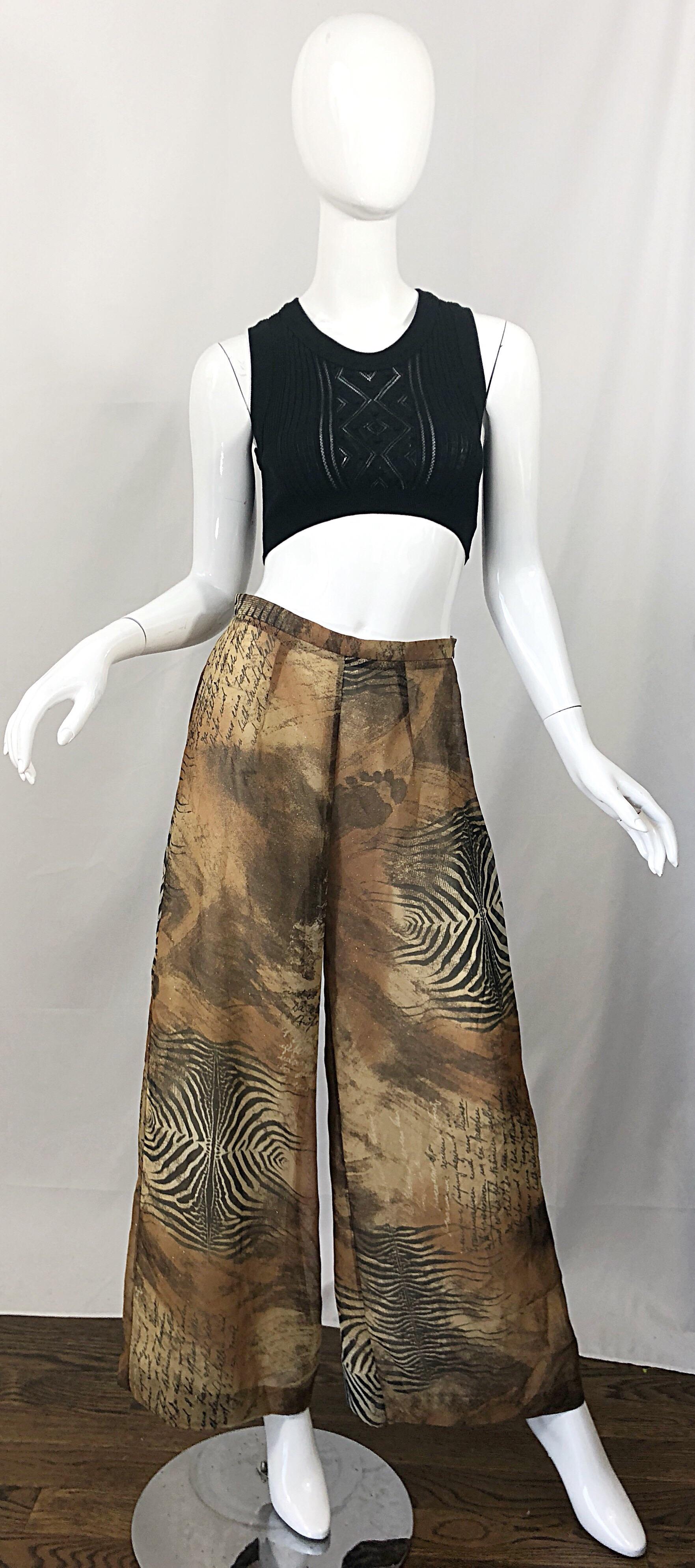 Amazing 1990s 'Footprints in the Sand' wide leg chiffon palazzo  pants! Features printed footprints, poetry, and animal zebra throughout. Neutral colors of tan, brown, brown and black throughout. Light metallic threading throughout (hard to photo).
