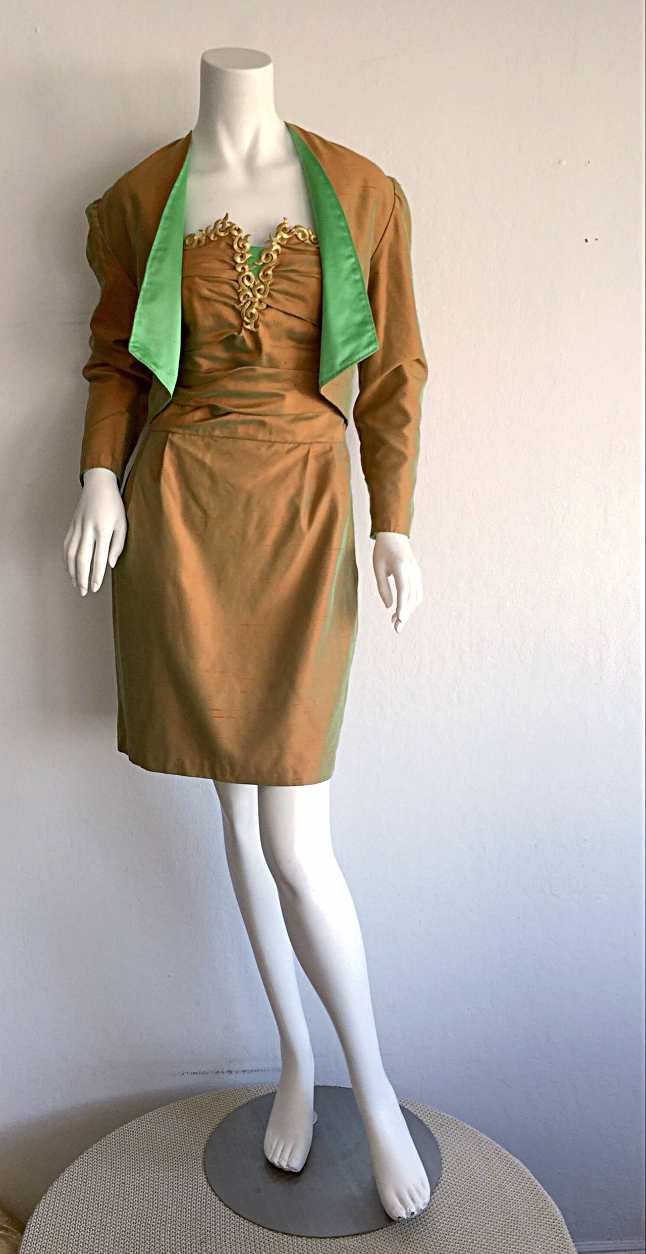 Exceptional vintage couture ensemble! Impeccable workmanship! Couture quality. Wonderful silk iridescent strapless dress, with Grecian inspired gold metallic trim.  Matching cropped bolero, lined in matching green silk. Hidden zipper up back of