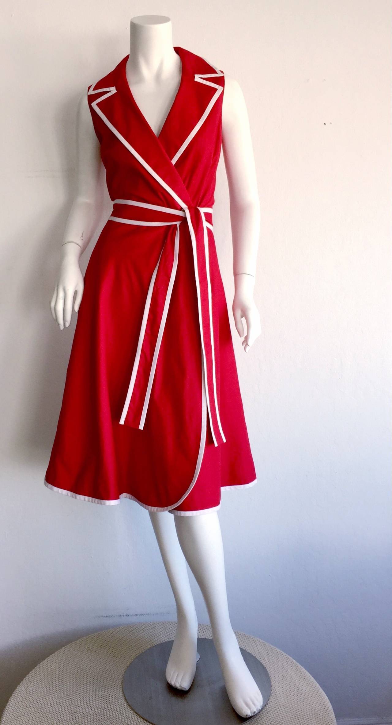 Beautiful cotton + linen blend 1990s Neiman Marcus nautical dress! Beautiful
 Bright lipstick red, with stark white piping. Features flattering wrap style shirt dress, with detachable tie belt. Wonderful from day to night. Fully lined. Marked size