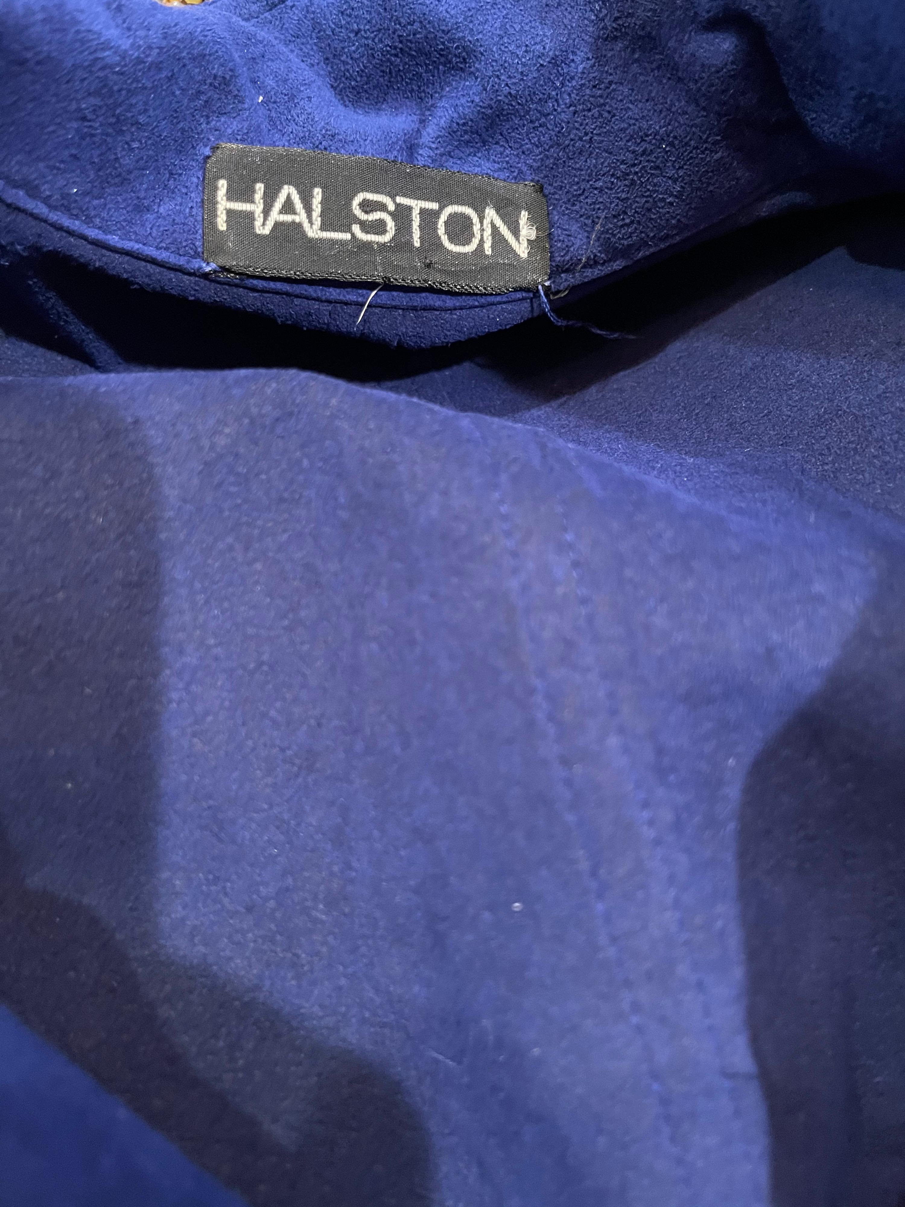 I have had a number of HALSTON Ultra Suede dressed before ( they always sell fast ), but I have never had nor seen one in this beautiful vibrant color before. This Halston long sleeve wrap shirt dress has two interior hook-and-eye closures at waist,