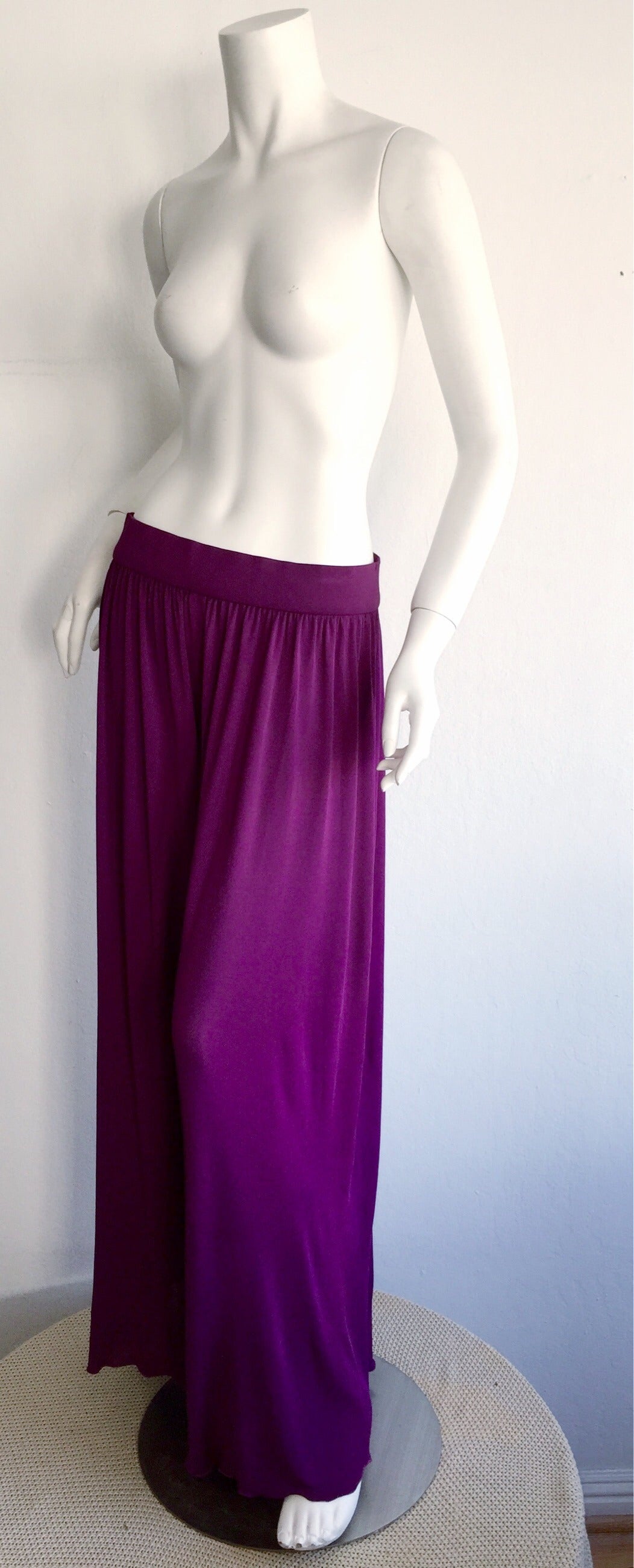 Chic vintage Holly's Harp purple violet silk jersey palazzo pants! Double layered silk jersey, that is very flattering on. Easy to dress up or down. In great condition, with one small snag at back waistband, that is not noticeable.  Pictured vintage