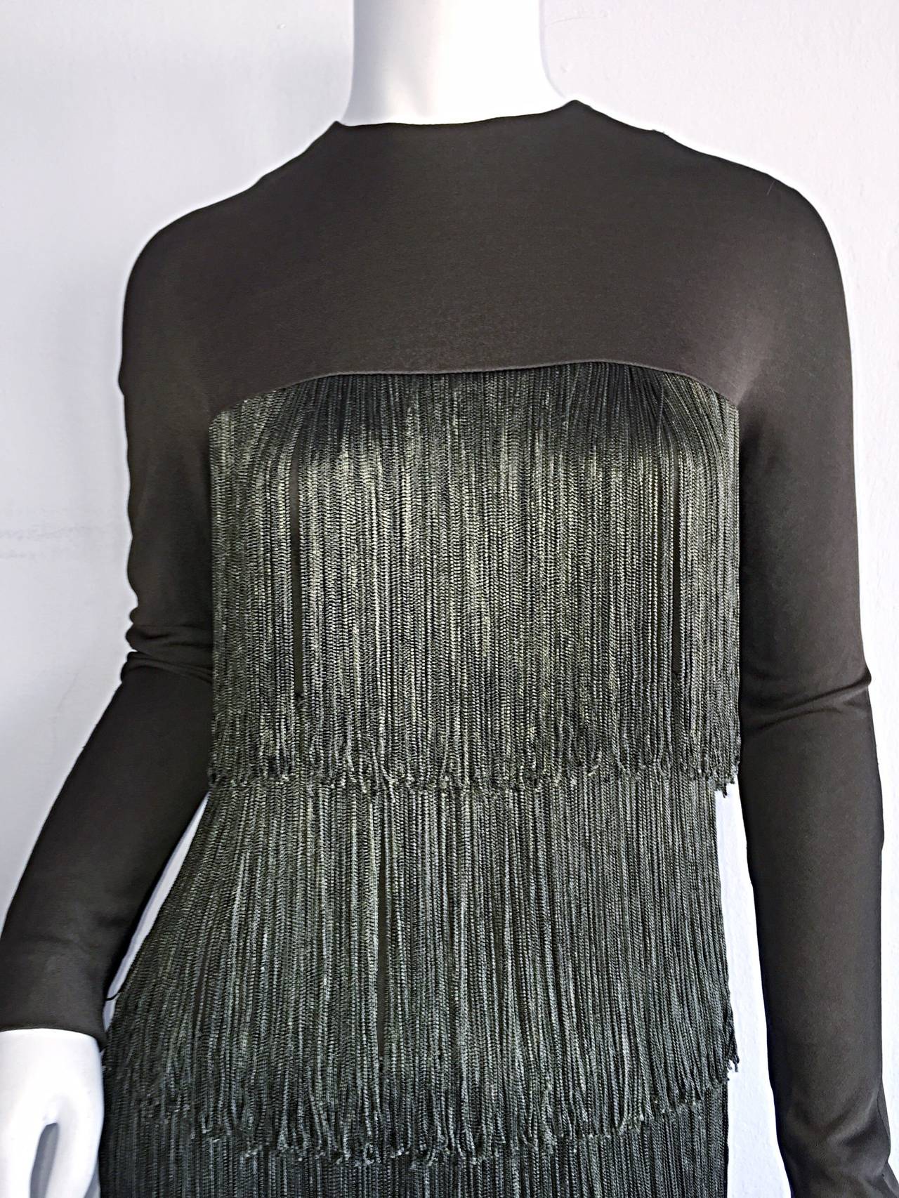 Superb Vintage Bill Blass fringe dress!!! Columns of silk fringe, with a double lined matching jersey bodice. Hidden zipper up the back, with hook-and-eye closure. A true masterpiece, that is an iconic Blass trophy. Musuem worthy. Approximately Size