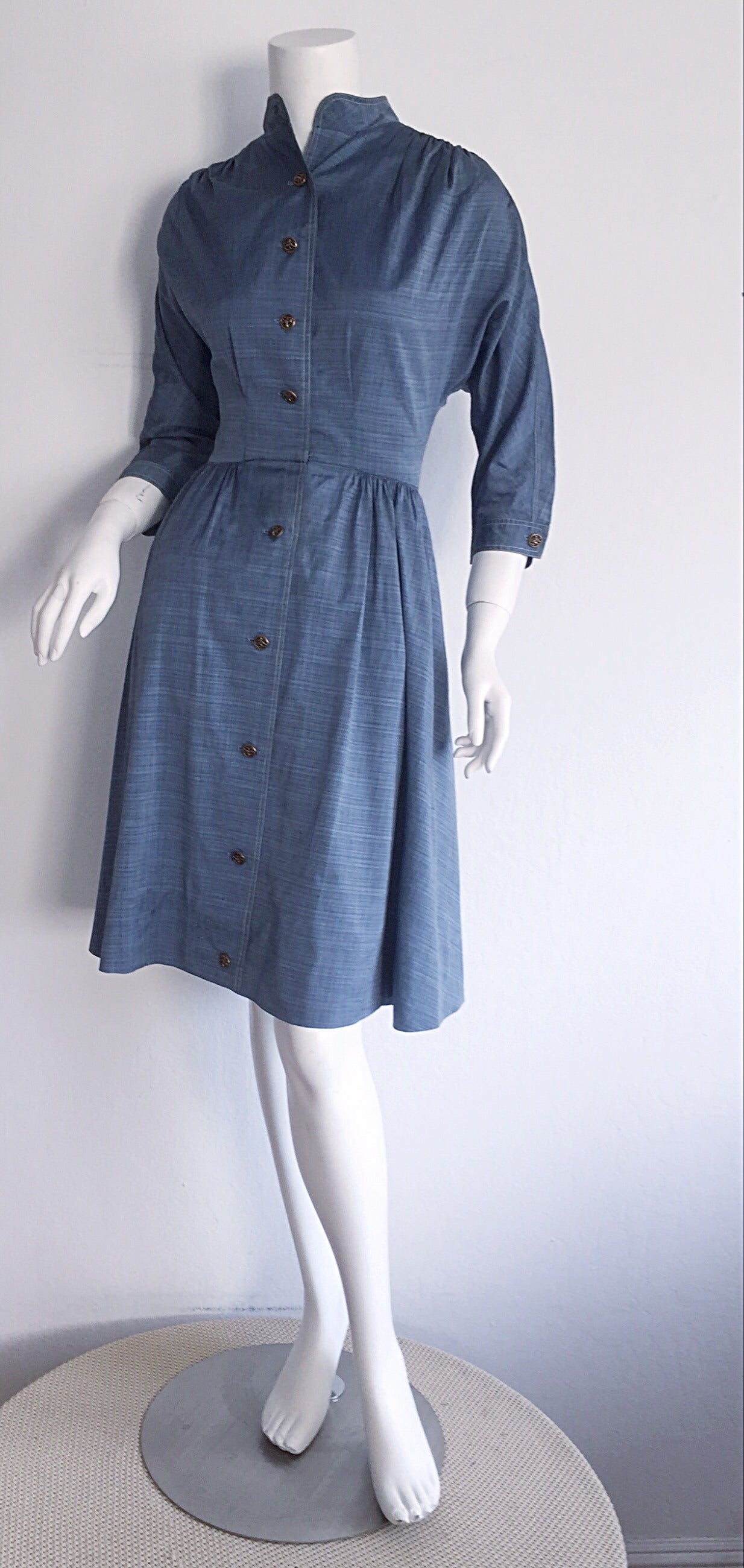 Incredible 1940s B. Altman & Co. Cotton Denim/Chambray dress, with horse buttons up bodice, and at sleeve cuffs! Beautiful lightweight fabric, with a flattering neckline, and full skirt. Intricate pleating at top shoulders. Also, looks great with a