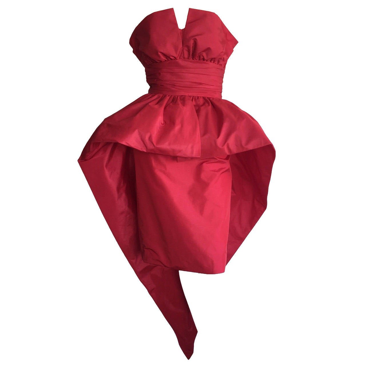 Amazing Avant Garde vintage Victor Costa lipstick red dress! Full Peplum detail at waist, that leads into the severe pointed train. Shelf bodice, that can be worn with the silk lapels pushed down, or left up. A showstopper, that is amazing on the
