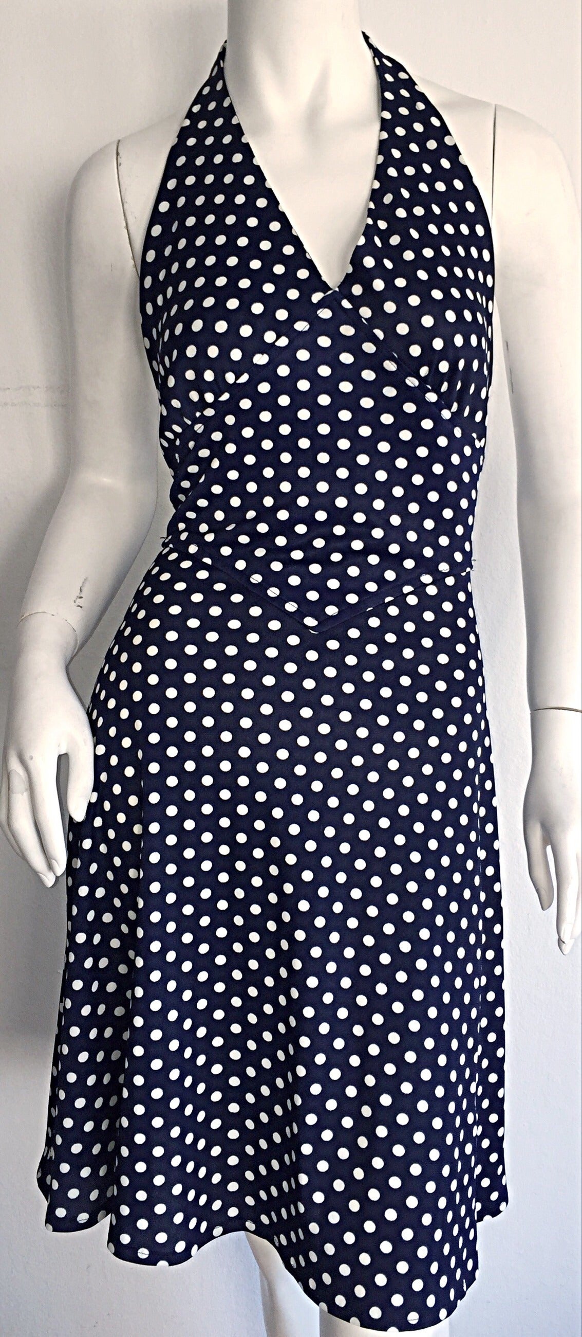 Cutest vintage Joy Stevens navy blue and white polka dot tie-back dress! Enough said to describe this beauty! Can easily transition from day to night. Looks amazing with sandals or wedges, yet, looks great with strappy heels for night. The perfect