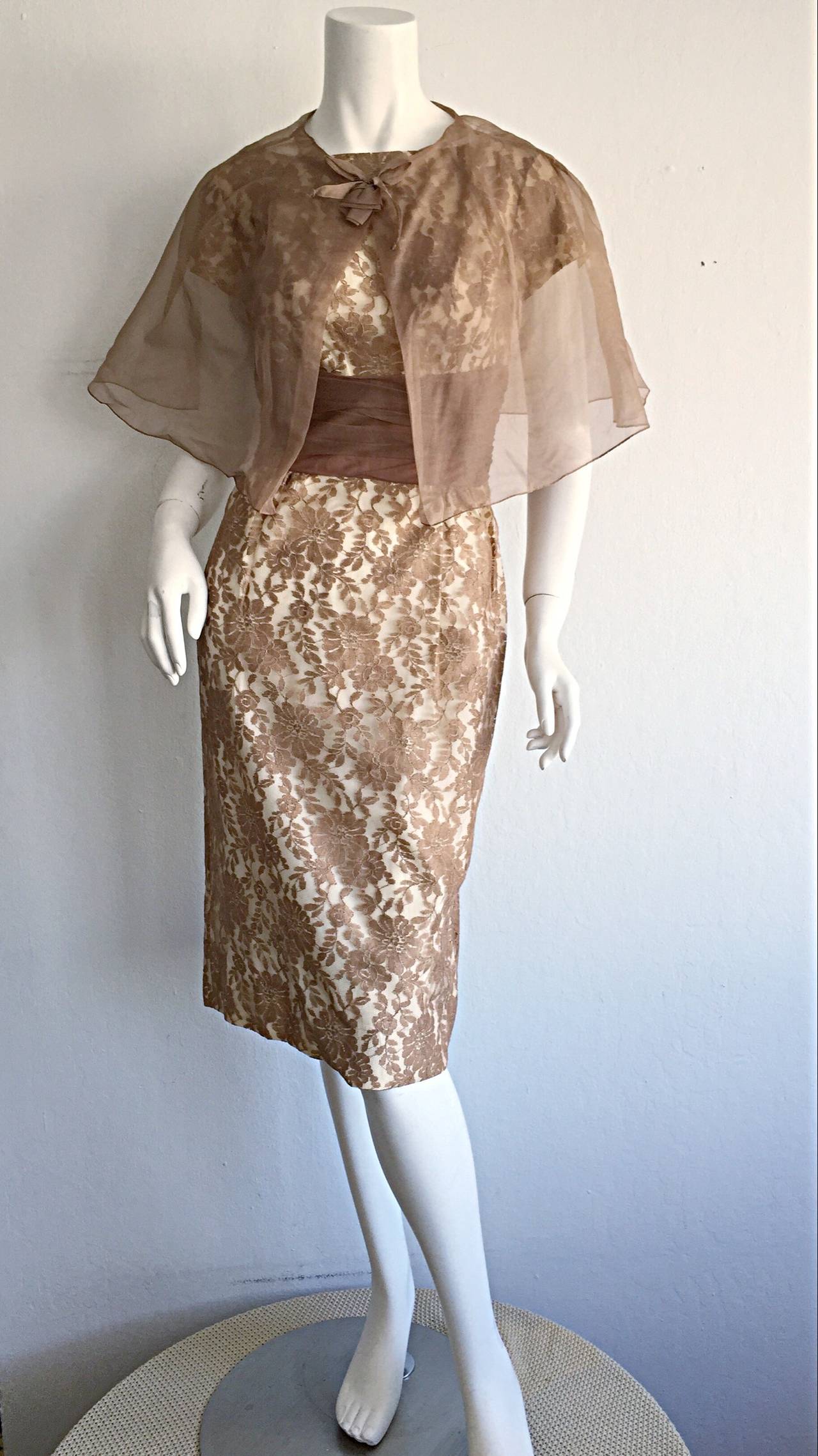 Amazing vintage 1950s Demi Couture French Lace dress and caplet! Wonderful beige/nude/brown color lace, with matching caplet. Impeccable construction, with the majority of the workmanship sewn by hand.  Bombshell fit that can easily transition from