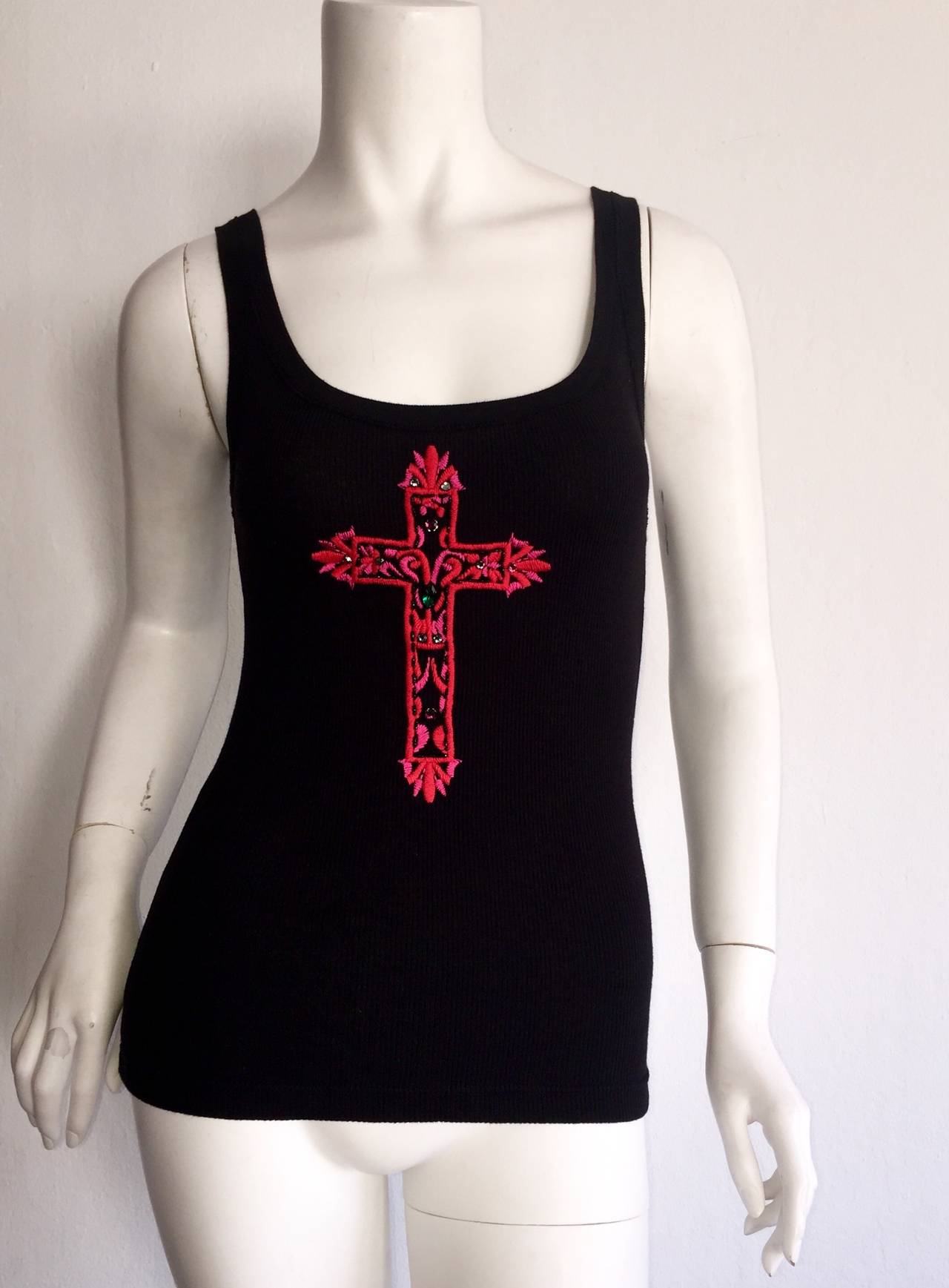 Beautiful classic black tank by Blumarine Jeans. Pink cross on front, embellished with jewels. Solid back. Perfect with jeans or shorts, and great tucked into a skirt! In great condition. Made in Italy. Approximately Size Small-Medium (Lots of