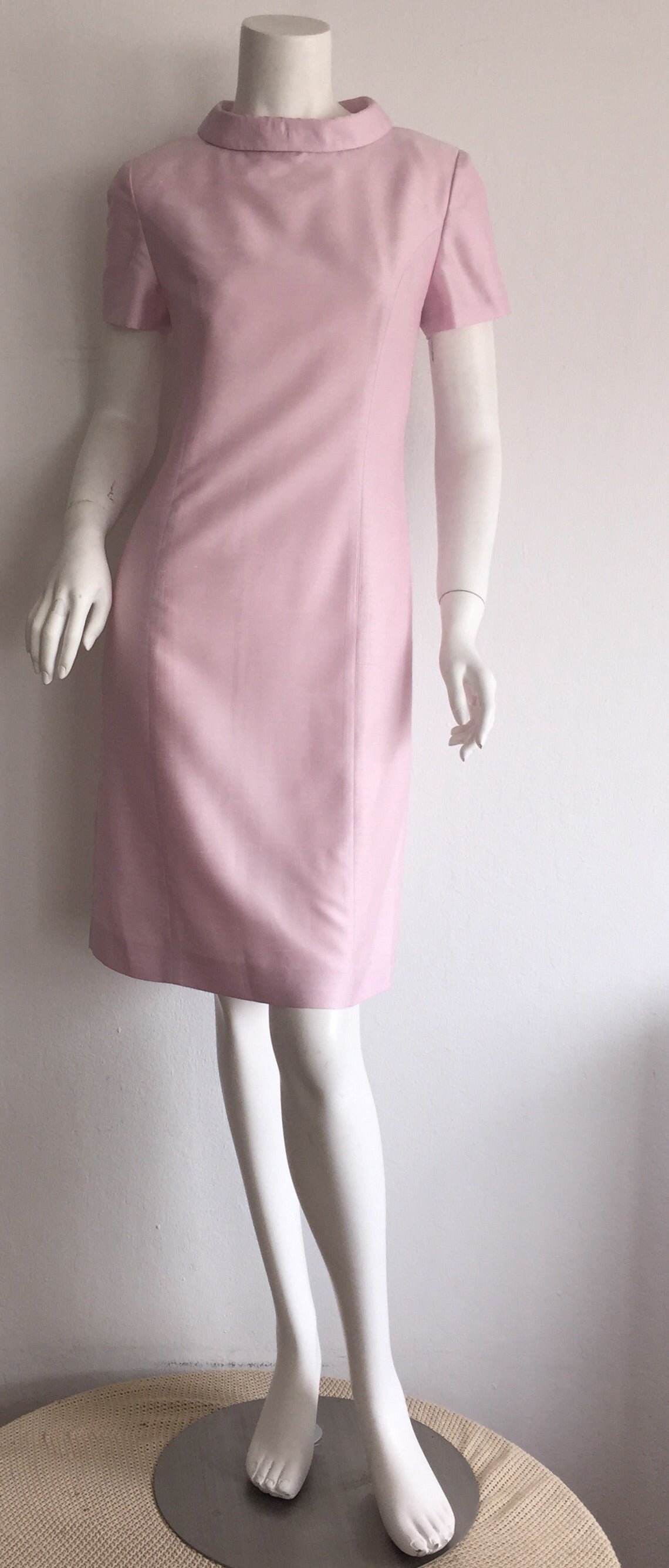 Beautiful vintage Courreges light pink silk dress! Jackie-O style, with the perfect shift shape! Easily goes from day to night with sandals, flats, or heels. Also, looks great belted. Fully lined. In great condition. Approximately Size