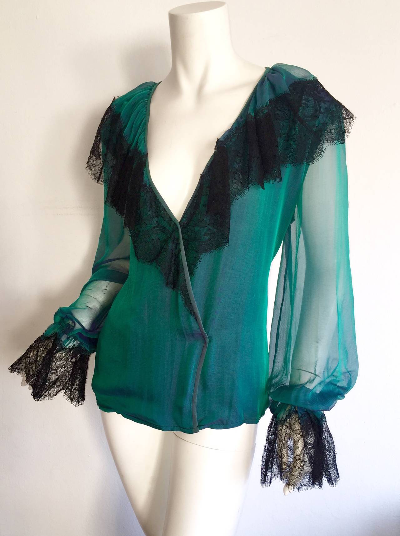 Stunning vintage Liancarlo silk blouse! Wonderful faux-wrap style, with black  French lace accents at collar and cuffs. Billow poet's sleeves. Looks great with jeans, or tucked into a skirt, or trousers. Bodice fully lined, with semi-sheer sleeves.