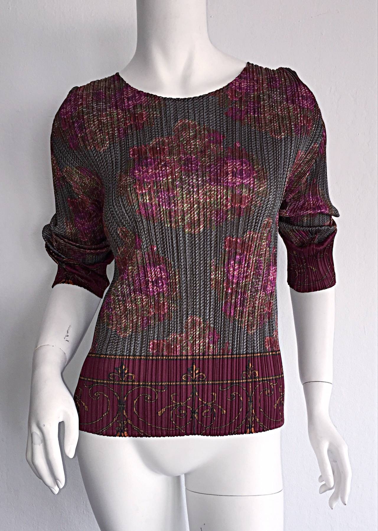 Rare Vintage Issey Miyake 'Pleats Please' signature blouse! Beautiful romantic, floral print, with a hint of regal! Signature pleat detail, with side vents. A stunning masterpiece, that easily goes from day to night. Looks great with capris, shorts,