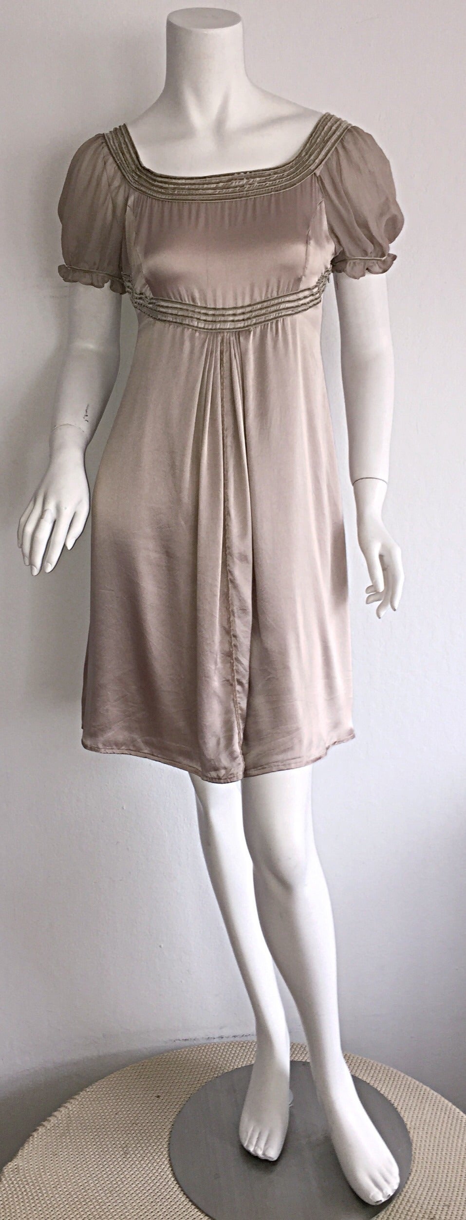 Such a sweet, romantic Marc Jacobs champagne/beige silk Babydoll dress! 1990s look, with a modern twist. Flattering pleats down front center. Velvet accents at collar and waist. Can easily transition from day to night. Fully lined. In great