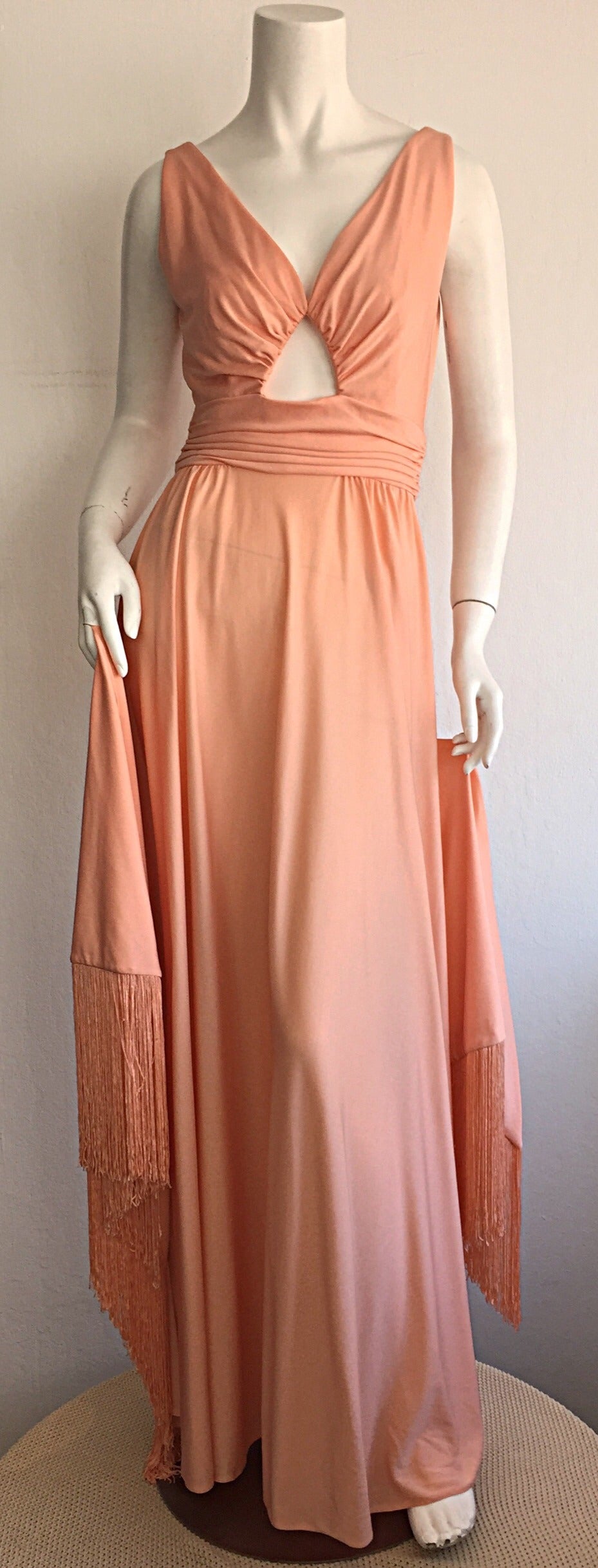 Wonderful 1970s Perullo for Fred Perlberg coral maxi dress AND fringed shawl! Dress features keyhole at bust, with a striking full skirt. Shawl has to slots for fingers. Looks great on the dance floor! Can easily transition from day to night.