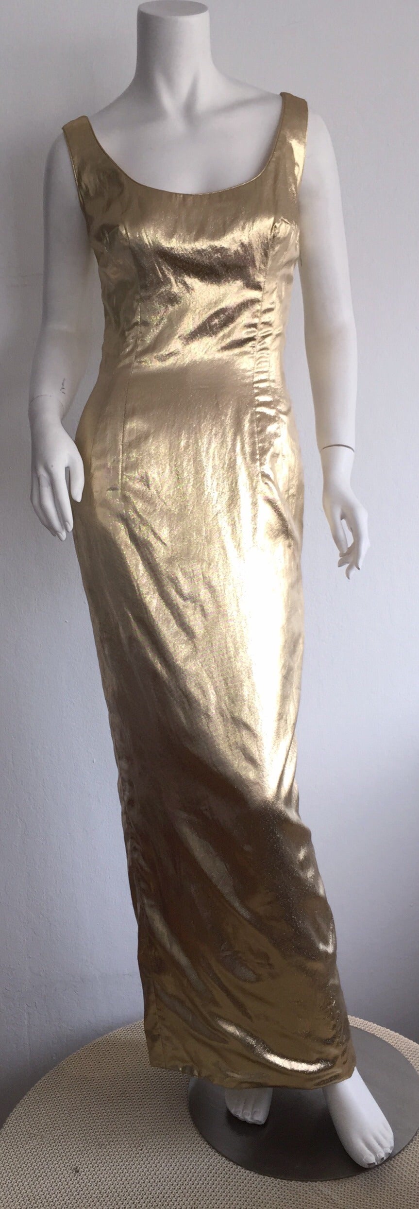 WOW! This vintage Mr. Blackwell Custom dress is OUT OF THIS WORLD! This is quite possible the best Mr. Blackwell piece I have ever seen! Dating from the late 1950s/ early 1960s, this dress is the epitome of sophisticated sexy! Perfect wiggle fit,