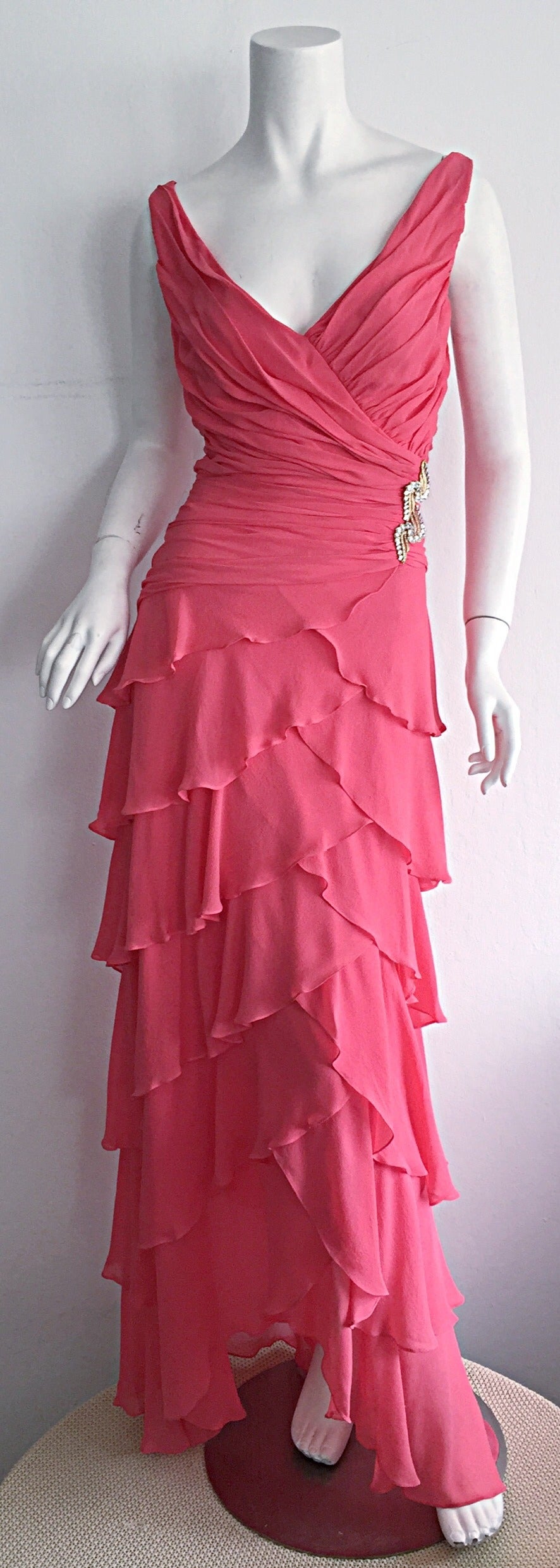 Gorgeous 1990s Tadashi Shoji pink silk chiffon tiered dress! Incredibly flattering bust, with layers of tiers throughout the entire gown, that look great with movement! Rhinestone details at side waist. Asymmetrical hem. Looks beautiful on! In great