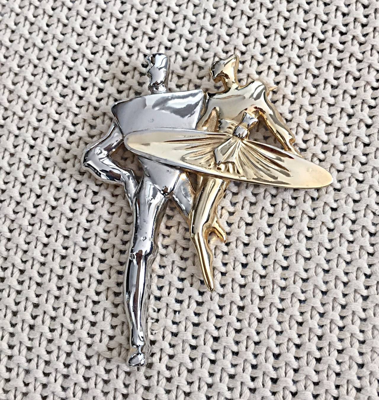 Absolutley incredible vintage Pierre Cardin modernist oversized brooch! Two-tone silver and gold, with dancing figures. A true statement piece, that adds just the right amount of 