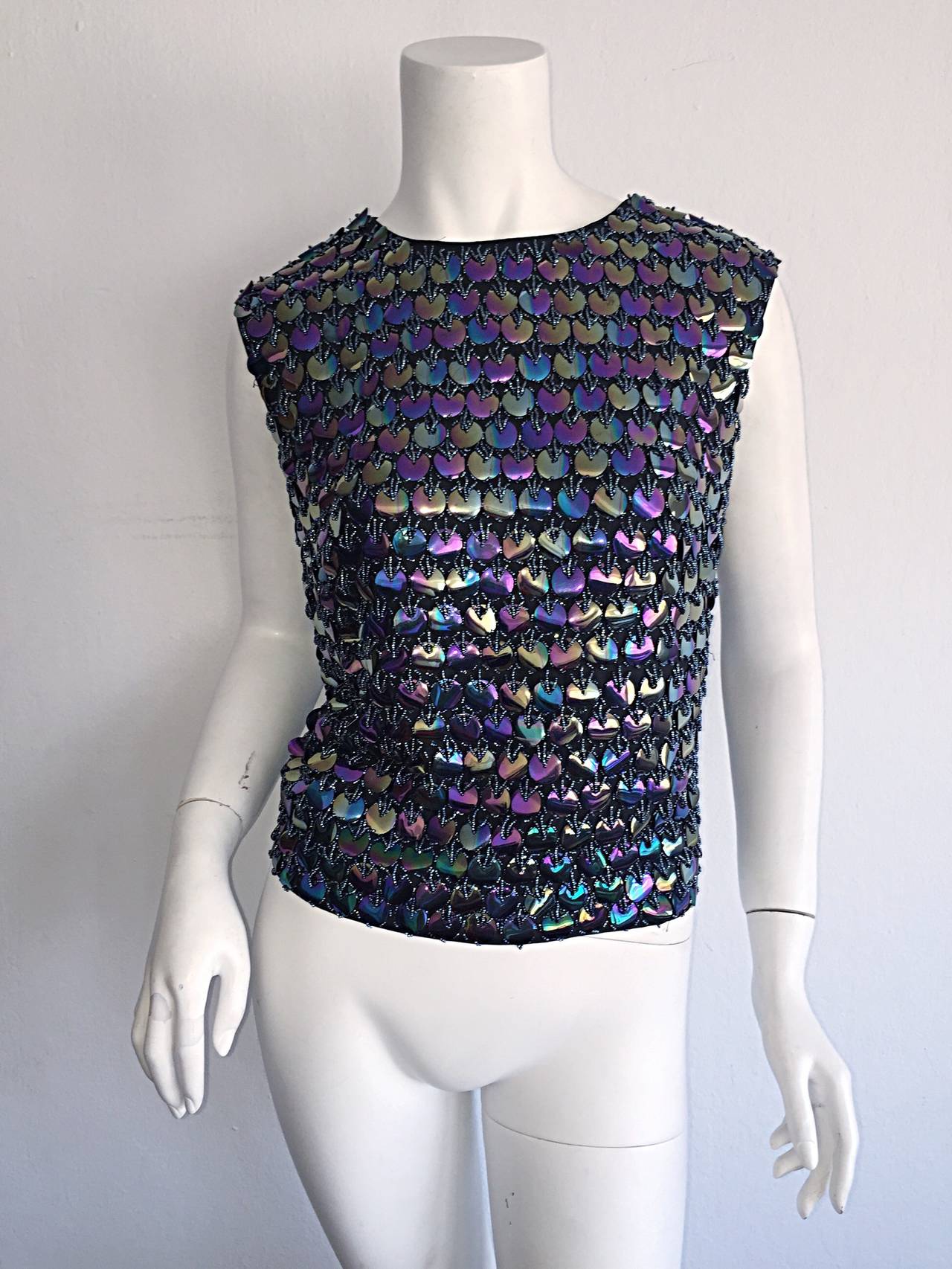 Fabulous 1950s Gene Shelly's silk beaded top!!! Fully hand sewn Paillettes and seed beads throughout, with a full metal zipper on the back. A true work of art! 100% black silk. Extremely versatile; can easily be dressed up or down. Looks great with