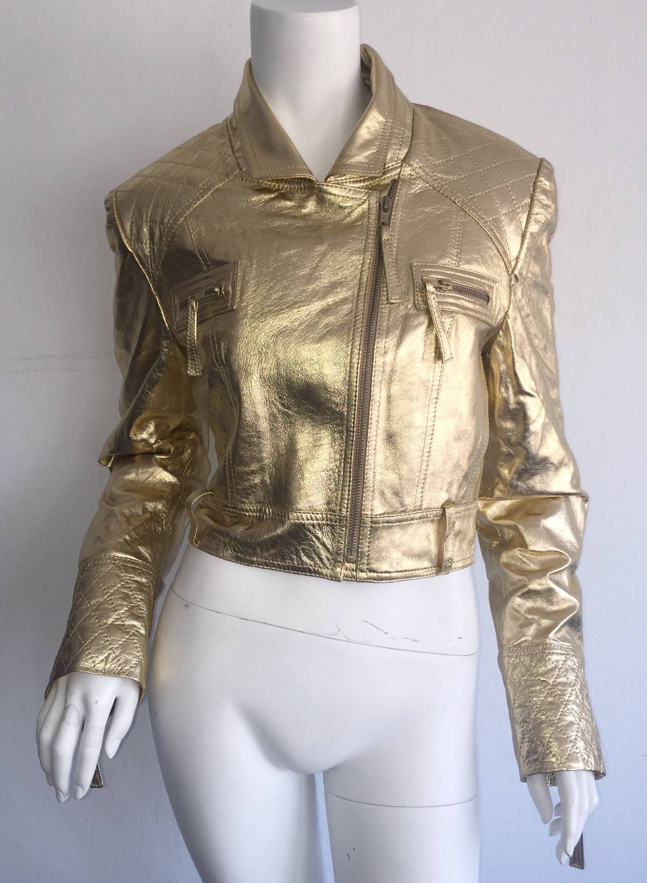 Incredible Victor Dzenk runway jacket! Bright gold leather, with tons of detail! Quilting at shoulders, and at cuffs. Functional zippers on each cuff. Can be worn fully zipped, half zipped, or left open. Looks great with jeans or shorts, or perfect