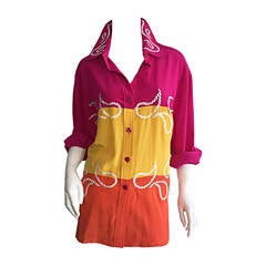 Blusa DVF de seda con estampado de cachemira en bloques de color de inspiración western de Diane von Furstenberg de los años 90