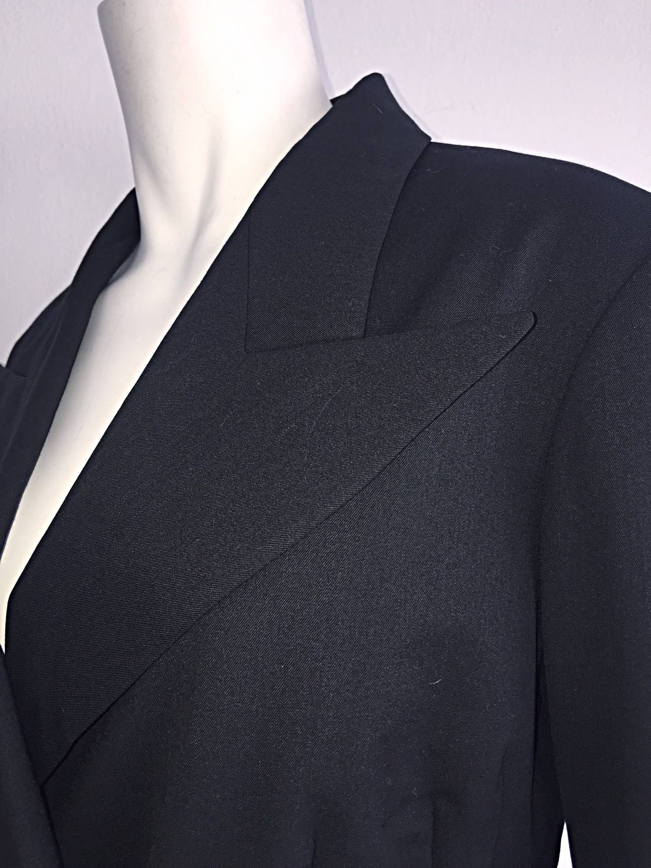 Amazing vintage Yohji Yamamoto black double breasted blazer! Signature Yohji 'slouchy' fit. Features Avant Garde oversized pointed collars, with two buttons down the exterior left side. Hidden interior buttons. Impeccable construction, with