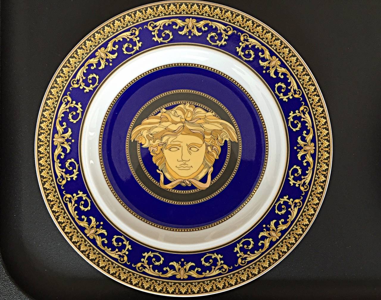 Serve in style with these incredible brand new vintage Versace plates! Signature style, on incredible china! Set of 6 plates includes styles; (1) Floralia Gold, (3) Russian Dreams, (2) Medusa Blues. All of these beauties were manufactured for