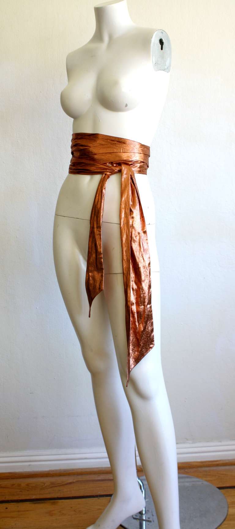 Vintage Lanvin raw silk belt in a gorgeous bronze color. Comes from well-know New York socialite. Can be worn a numbers of way. Label is missing. Measures 141 inches long.