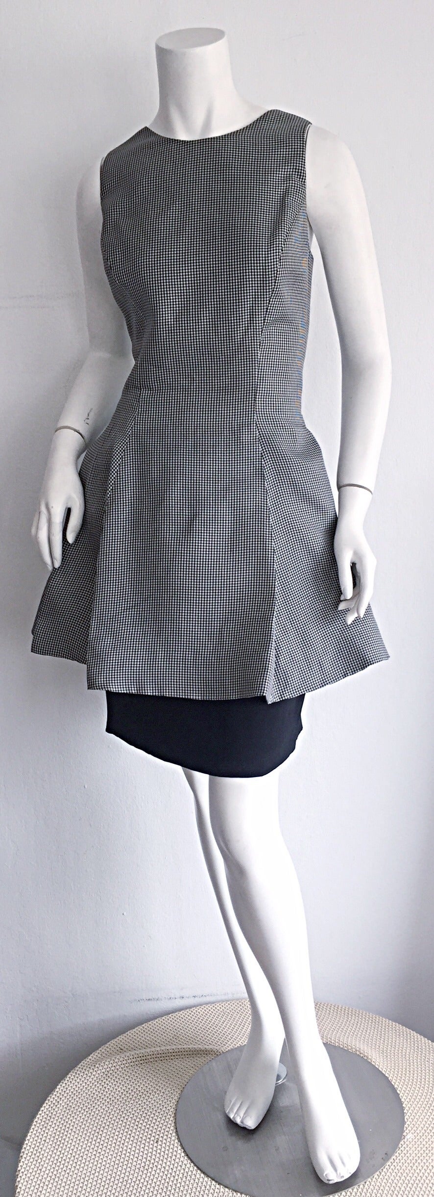 Stunning vintage James Purcell 'Fit N' Flare' black and white gingham dress! Features low-cut back, with a slight Avant Garde flare! Features flared overdress, with an attached black silk pencil skirt. Impeccable construction, that Purcell was so