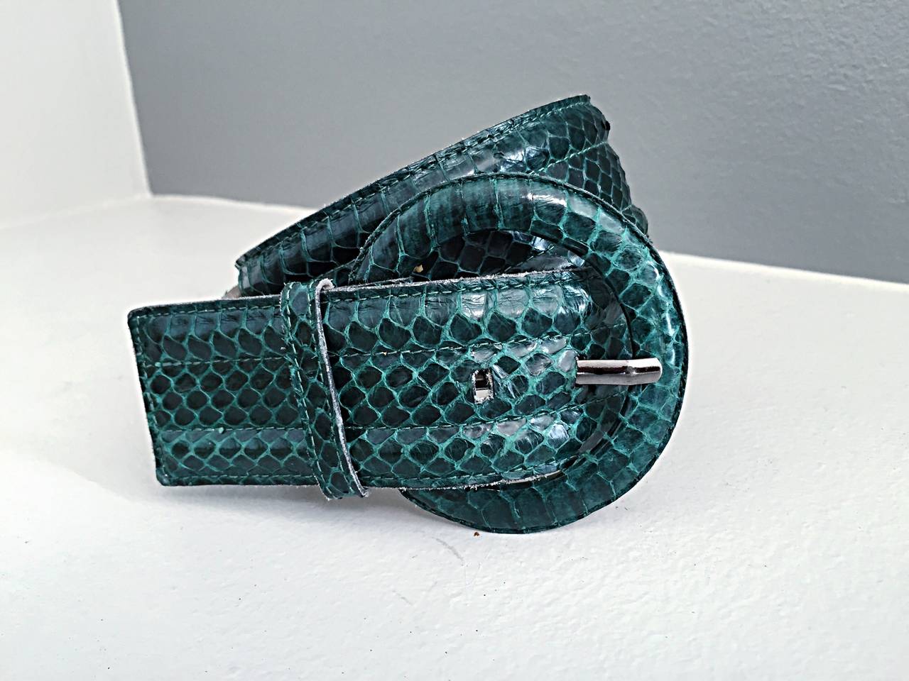 Statement worthy vintage Yves Saint Laurent green python belt! Vibrant green color, with the finest farm-raised python skin. Significant width. Goes with pretty much everything, and can easily be dressed up or down. Lined with vacceta leather.