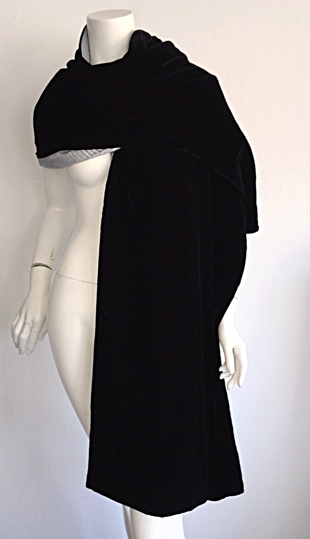 Stunning 1940s black silk velvet opera shawl! Luxurious black silk velvet, with a subtle silver accordion backing. Huge size, which is not only stylish, but extremely comfortable! Can easily be dressed up or down. In great