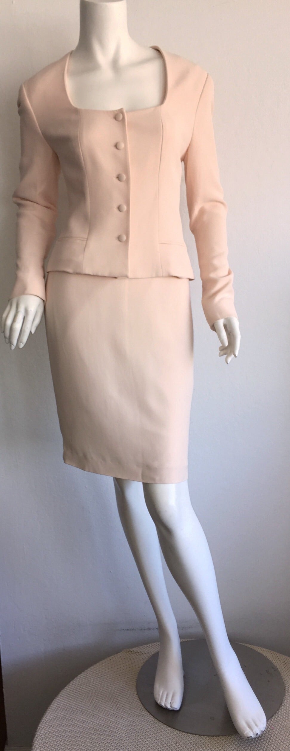 Pretty vintage Guy Laroche light pink skirt suit! Extremely flattering fit on a gorgeous color! Amazing cut on both the blazer and skirt! Perfect together, yet great as separates! Made in France. In great condition. Marked Size EU