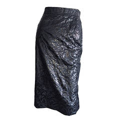 Superbe jupe noire vintage Yves Saint Laurent en soie découpée au laser à taille haute, taille 44