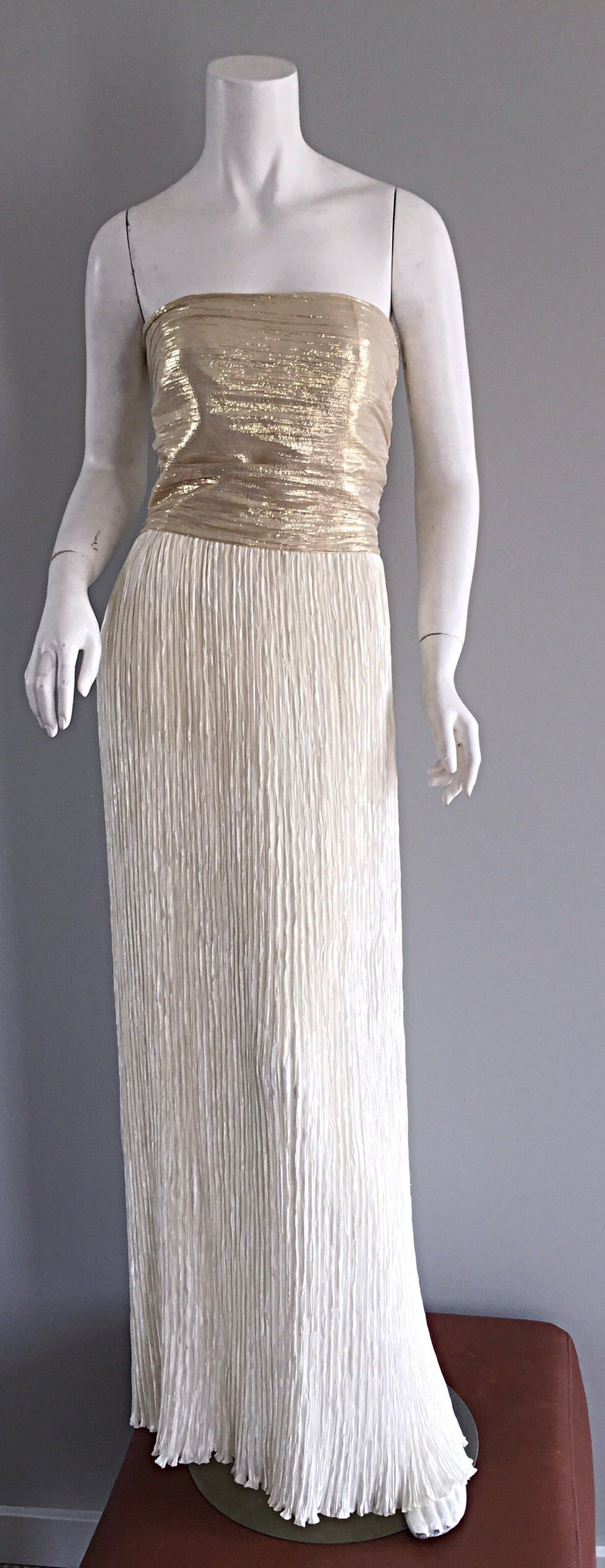 Absolutely stunning vintage Mary McFadden Couture gold and ivory strapless fortuny pleated silk gown! Pleated gold lame bodice, with signature McFadden fortuny silk pleated ivory skirt. Ultra flattering fit! Looks great with the matching vintage