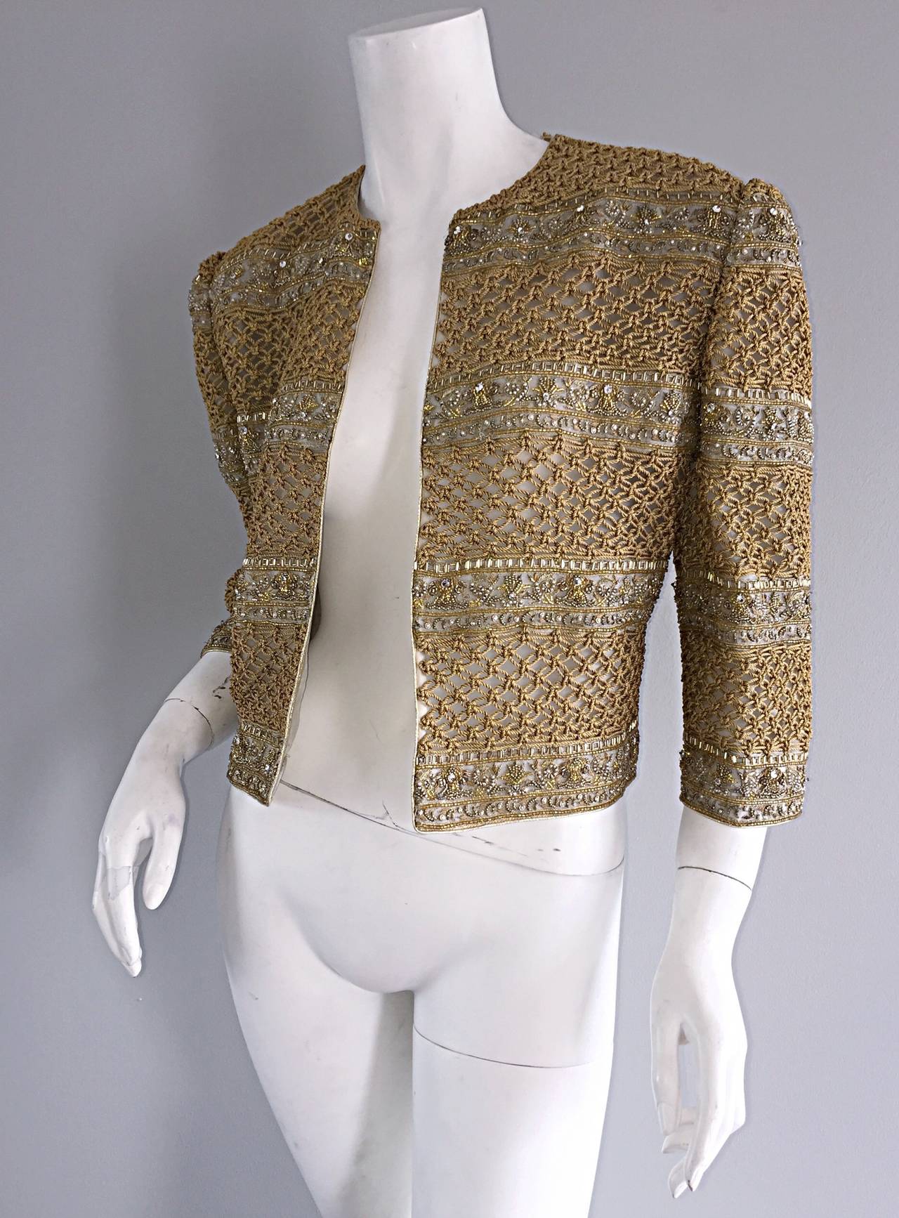 Incredible vintage Mary McFadden Couture gold threaded/beaded jacket! Words cannot even begin to describe the amount of work that was put into this couture piece! Gold handwoven thread detail, intermixed with beading and rhinestones throughout. Can