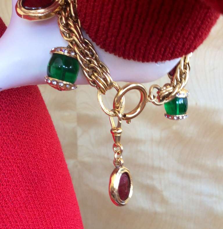 Vintage Chanel Gripoix charm bracelet with rhinestones. Gorgeous green and red Gripoix charms, perfect for Christmas!!! All stones intact. Signed. In great condition