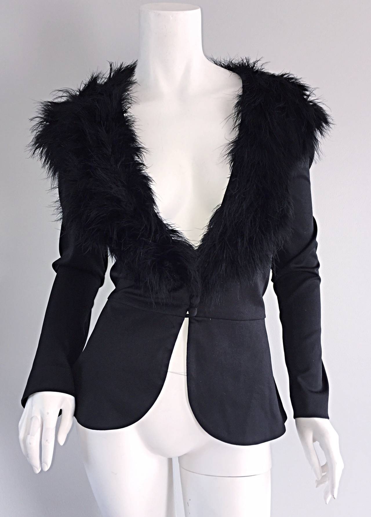 Sensational vintage Lilli Diamond black cardigan/jacket! Tailored fit, with flattering construction. Feathered collar. Perfect with a skirt, or over a dress, yet perfect with jeans. Buttons up the front. In great condition. Approximately Size Medium