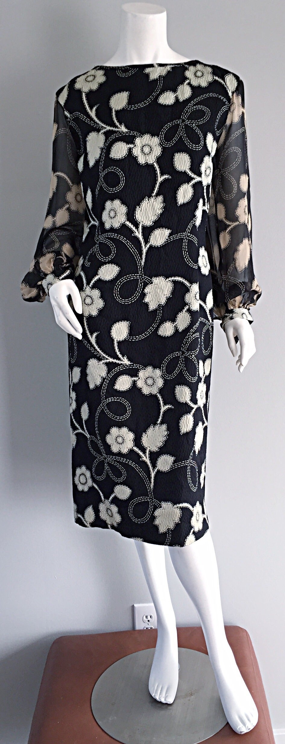 Incredible 1960s Pauline Trigere black and white silk shift dress! Features mod floral print throughout (on textured silk), with semi-sheer billow sleeves. Looks great alone, or belted, with or without stockings. Hidden zipper up the back. Fully