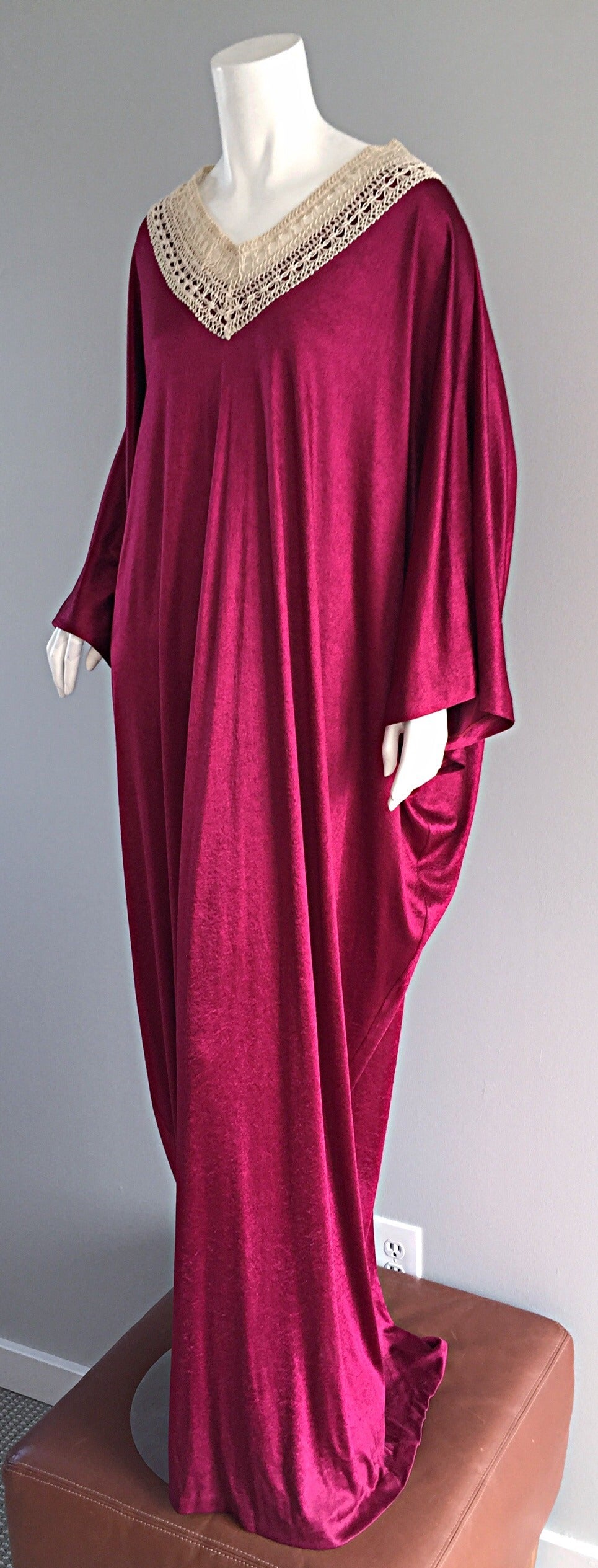 Absolutely beautiful vintage Mary McFadden caftan / kaftan! Rich wine/burgundy color, with ivory hand-crochet collar. Slinky Grecian fit. Looks incredible on! Perfect as an evening ensemble, or over a swimsuit. In great condition. Made in United