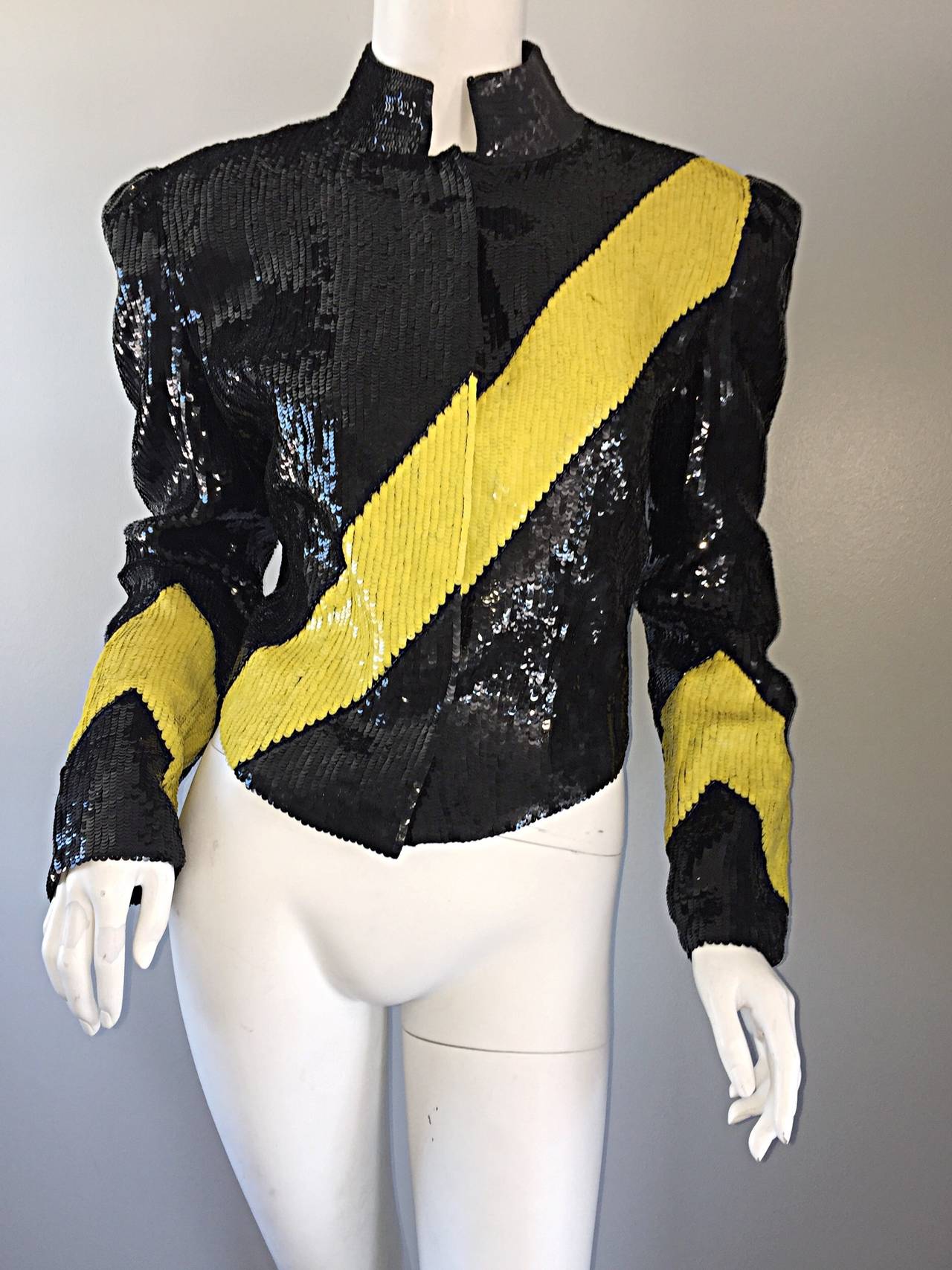 My FAVORITE jacket EVER!!! Vintage Carolina Herrera SUPER RARE all-over sequin jacket! 'Caution Tape' style, with an Avant Garde flare! Chic mandarin collar. Can easily transition from day to night...Loos great with jeans, yet effortlessly chic