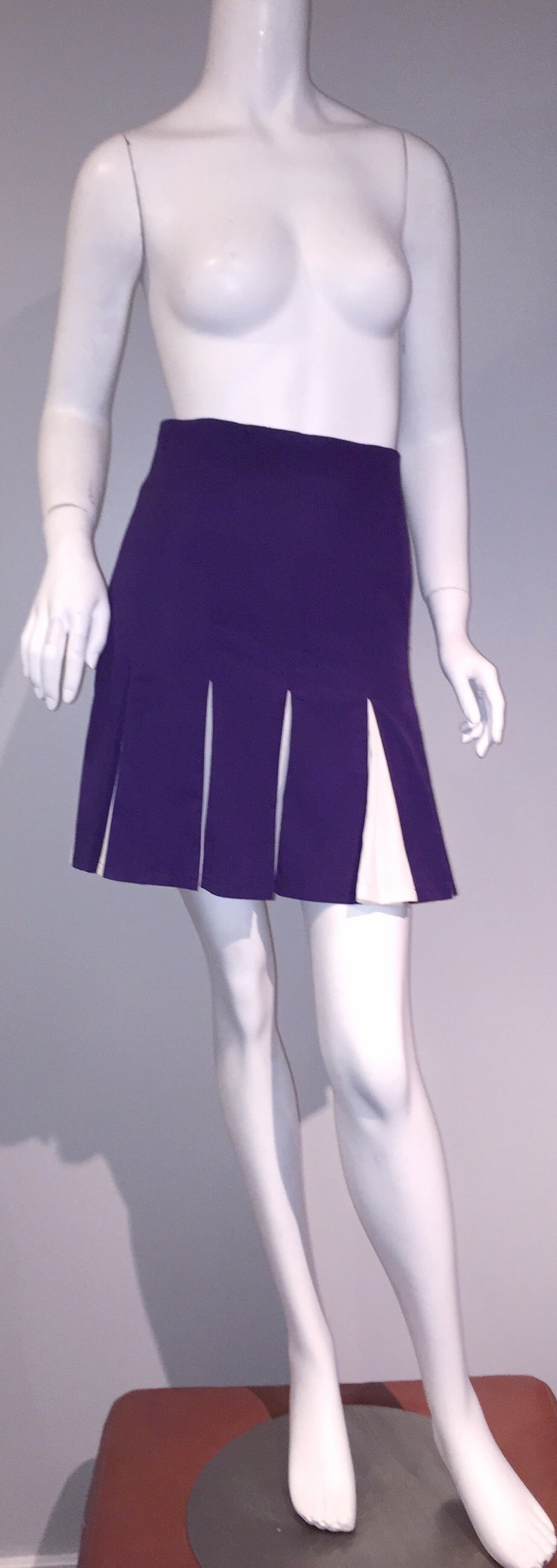 Wonderful 1990s Plein Sud high-waisted pleated skirt! Vibrant purple color, with white knife pleating. Looks amazing on--Very flattering fit! Perfect for day or night. Great with a tank and sandals for day wear...great with a blouse or sweater, with