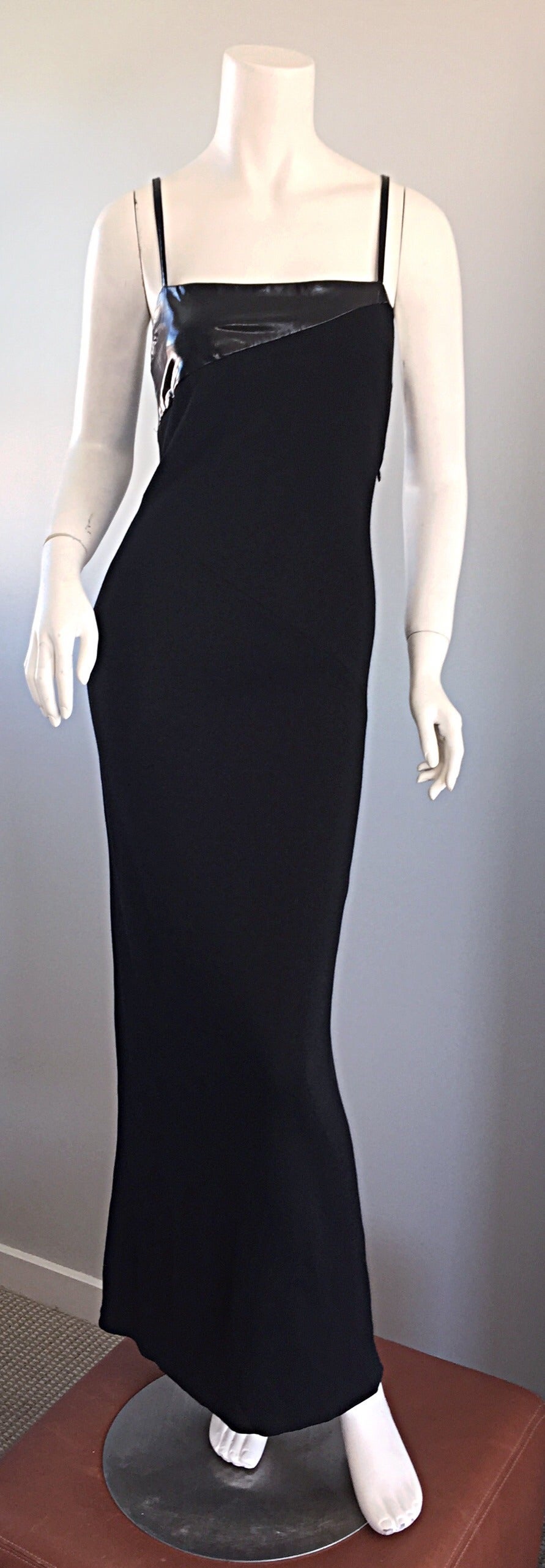 Sexy vintage Gianfranco Ferre black jersey dress, with pleather details at bust and shoulder straps! Body hugging fit, that is very forgiving, yet extremely flattering! A definite head turner! Hidden zipper up the side. Looks great alone, or belted.