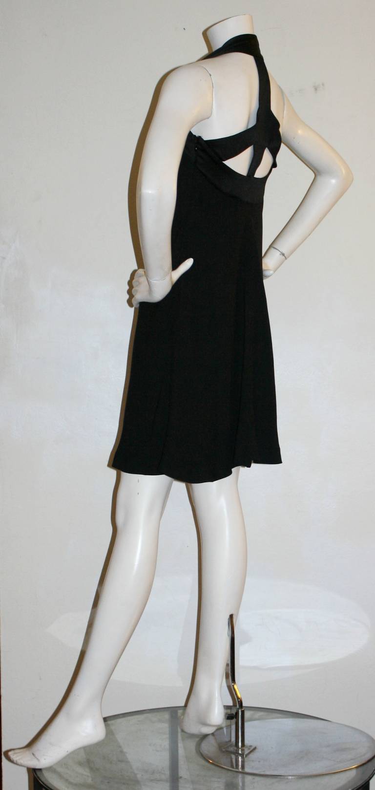 Iconic 1990s Moschino Cheap and Chic Peace Sign Cut Out Vintage Black Dress LBD In Excellent Condition In San Diego, CA