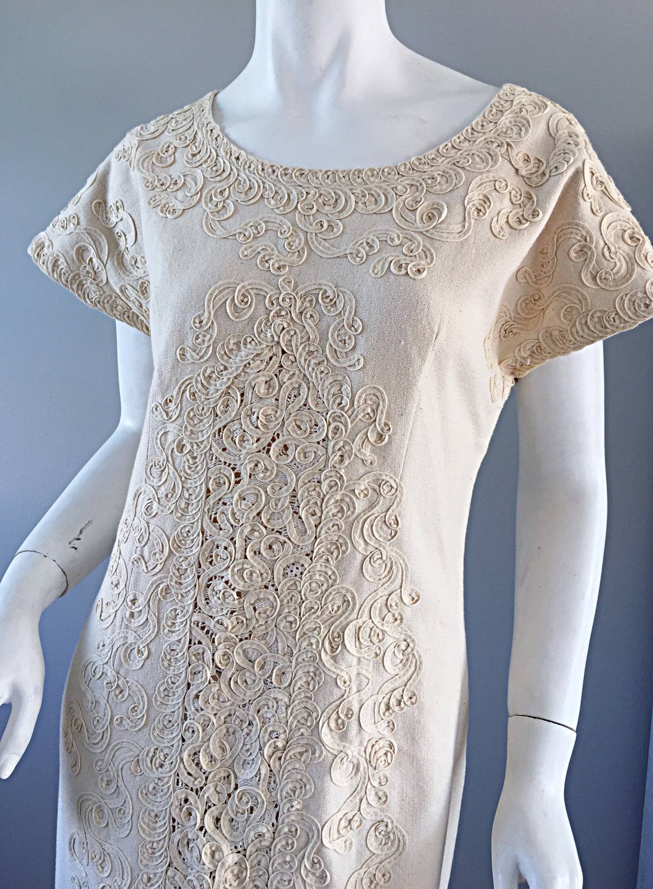 Beautiful and RARE vintage Tachi Castillo dress! Exquisite hand embroidery throughout the entire dress! Slight dolman short sleeves. Pictures do not do this piece of art any justice! Looks great on. Perfect for a Bohemian wedding! Hidden zipper up