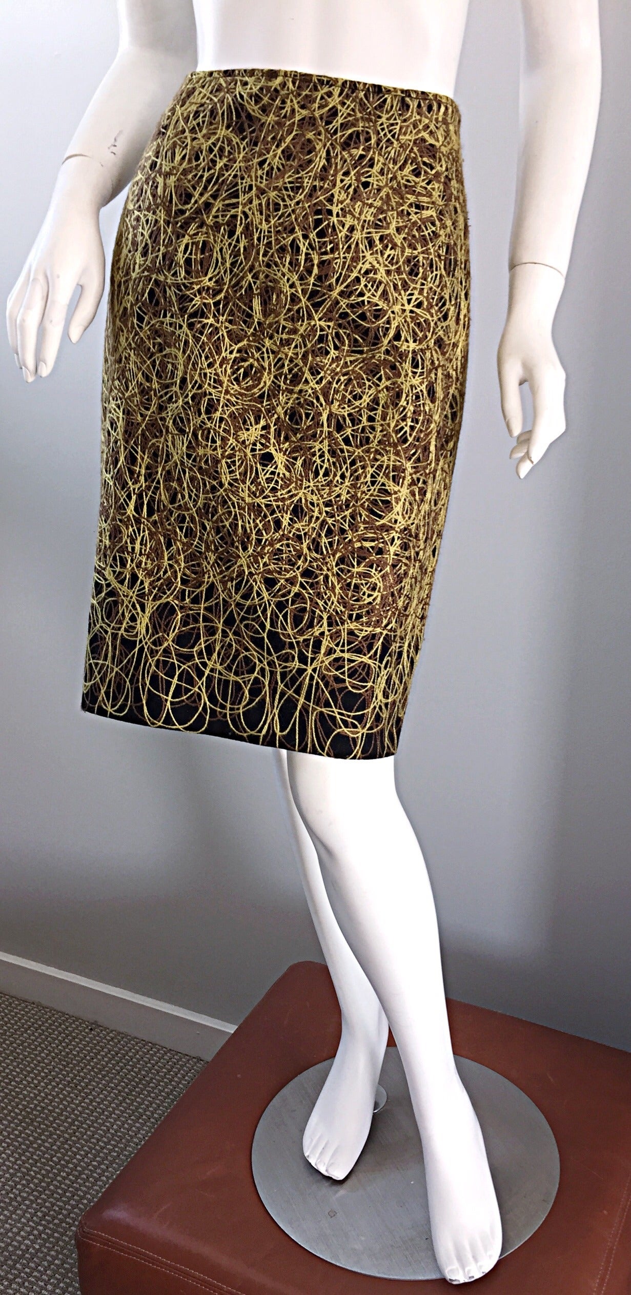 Awesome vintage Jean-Charles de Castelbajac high waisted pencil skirt! Intricate embroidery, featuring yarns of yellow and brown that form a scribble print throughout the skirt. SO much detail to this form fitting wool skirt! Can easily be dressed