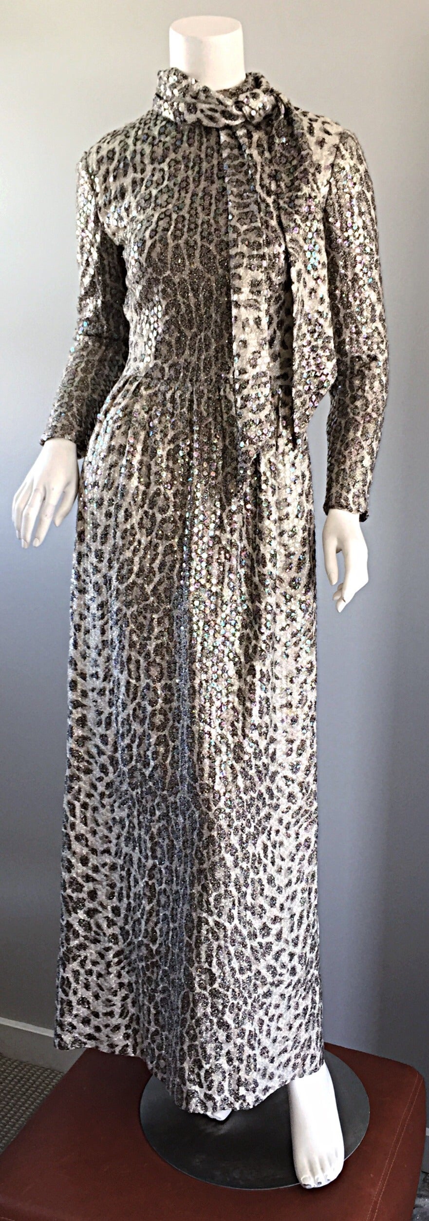 Incredible vintage Adele Simpson 'Snow Leopard' all-over sequin dress and sash! With leopard prints all over the current runway, this dress is right on trend! Chic leopard print throughout, with thousands of iridescent sequins. Hidden zipper up the