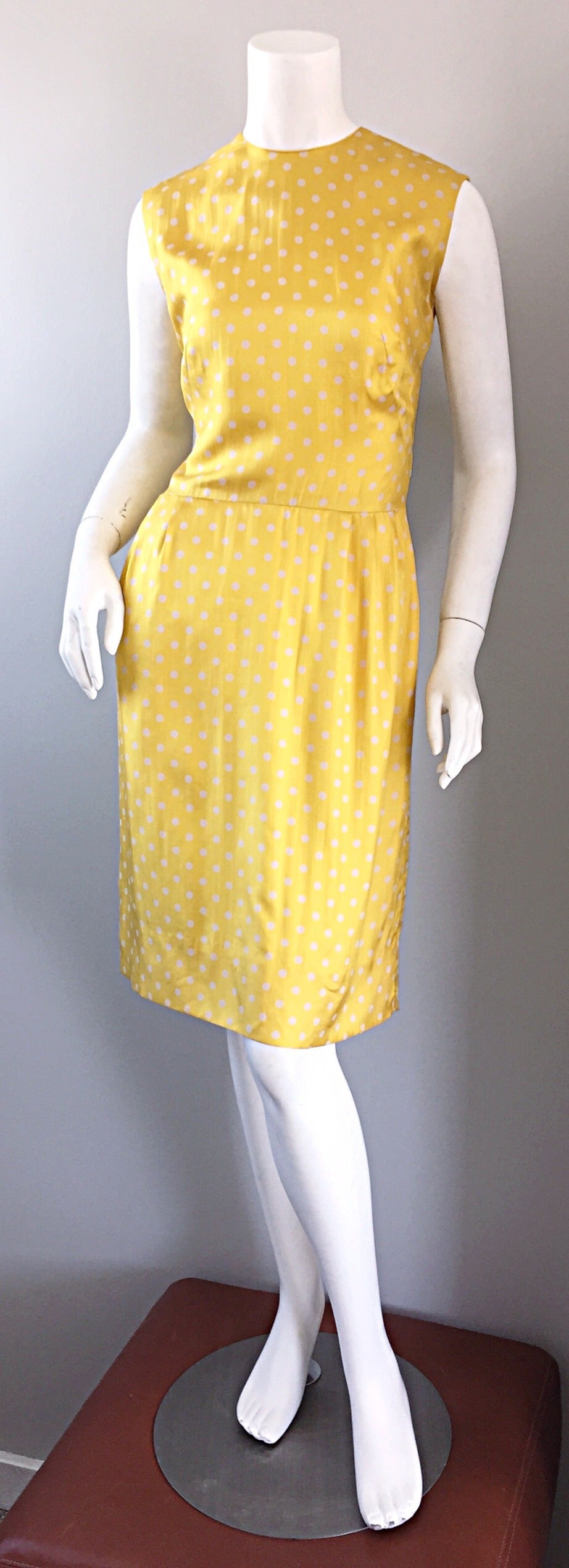 Amazing late 1950s/very early 1960s Addie Masters silk dress! Vibrant yellow color, with white polka dots throughout. Addie Masters was a very important Californian designer in the 1940s-1950s. Her designs are rare to come by, and are known for