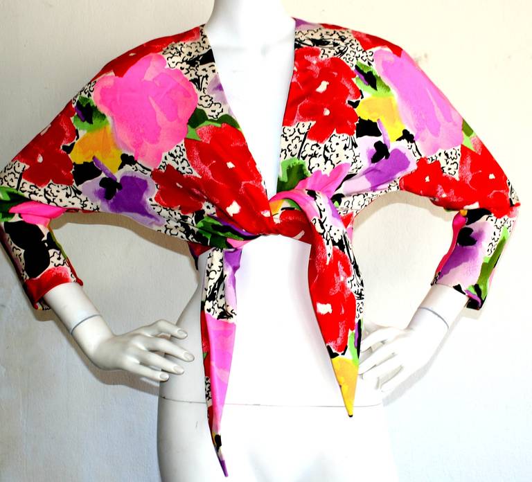 Stunning vintage Pierre Cardin Tie blouse/bolero! Features bold abstract prints. From the Summer 1989 Runway show, as marked. In great condition. Can fit Size Small to Medium, due to stretch, and tie waist