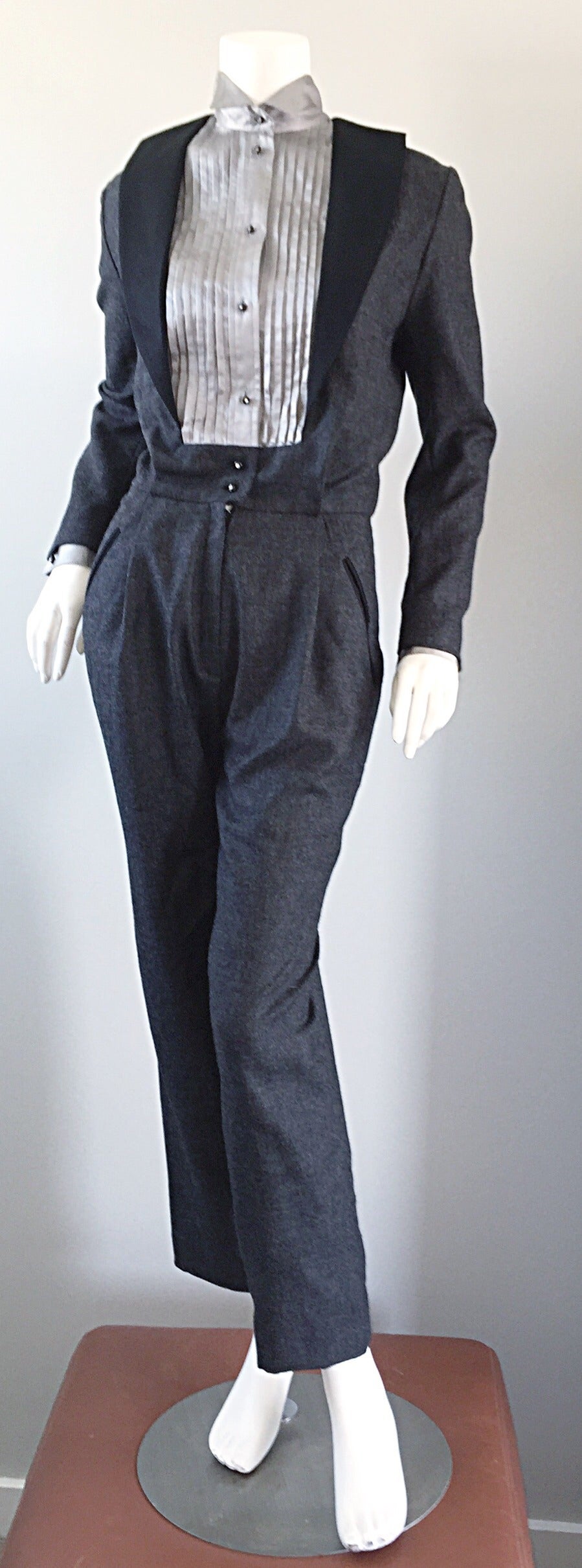 Insanely rare very early Alberta Ferretti tuxedo jumpsuit! Charcoal gray, with a silver silk blouse. Black silk shawl collar. Black buttons, with rhinestone centers down the front, and at each cuff. Lots of attention to detail. A must-have for any