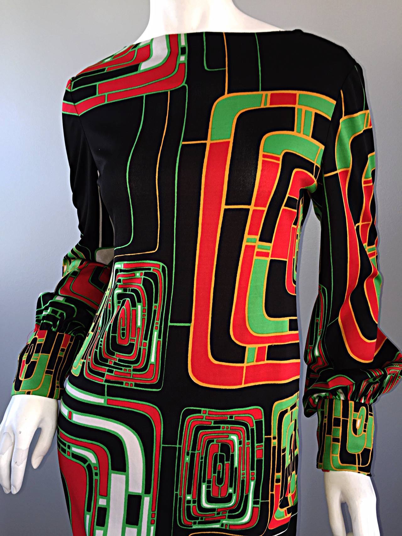 Amazing vintage Rizkallah for Malcolm Starr op-art maxi dress! Fabulous print throughout the dress and sleeves. Wonderful fit, with snaps at each cuff. Looks great alone, or belted. Can easily transition from day to night with the right accessories.