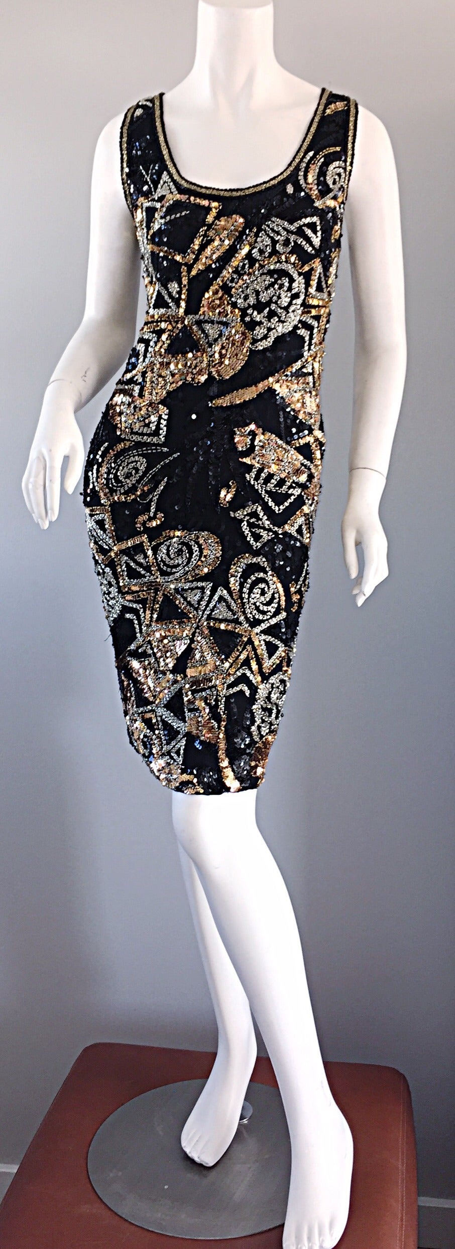 Outstanding vintage Oleg Cassini beaded/sequined cocktail dress! 100% silk shell, with thousands of gold, silver, and black sequins and beads throughout, which form a 'Galaxy