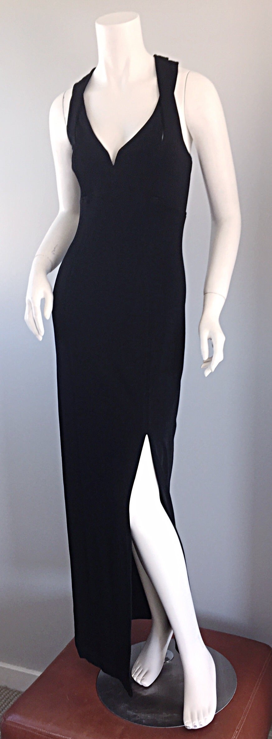 Sexiest vintage Tadashi Sohji black gown, with cage/cut-out back! Extremely flattering, with just the right amount of sexiness! Slight cut-out detail at bust, with a slit up the front side. Sweetheart neckline. Bodycon fit, with fantastic stretch